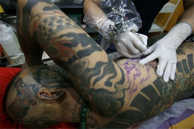 Татуировочный маньяк Лиу Минг (7 фото)