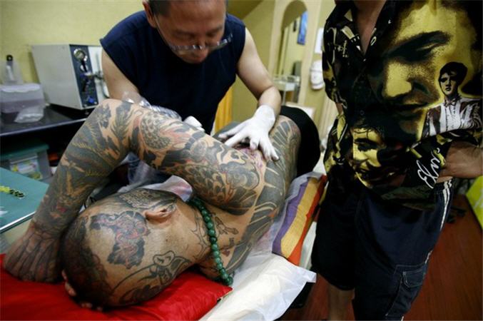 Татуировочный маньяк Лиу Минг (7 фото)